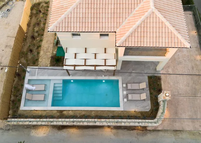 Theoni House *